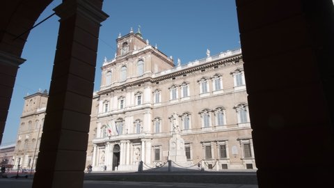 Panoramic view of the Palazzo Ducale in Modena during the bright sunny day against the clear blue sky. a Baroque palace in Modena, Emilia-Romagna Italy.
