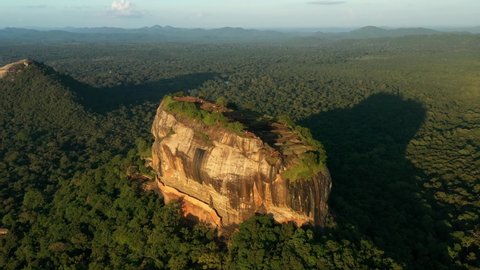 Aerial Drone View Of Sigiriya Rock Fortress On Lion Rock During Sunset.