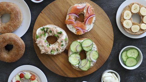 Grabbing a Cucumber Bagel from a Variety of Bagels