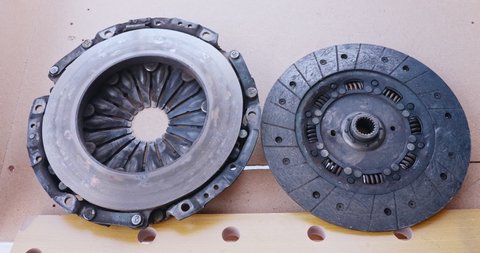 Clutch disc and clutch basket just disassembled from a car because no longer functional