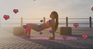 Animation of heart icons over biracial woman exercising on promenade. health and fitness concept digitally generated video.