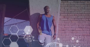 Animation of data processing over african american man with headphones outdoors. health and fitness concept digitally generated video.