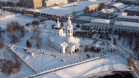 Aerial view of the central part of Orel. Epiphany Cathedral in the city. Russian urban winter landscape. Beautiful sunny day.