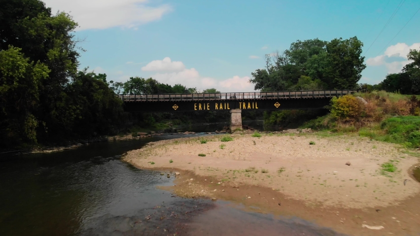 Aerial Shot of Eerie Rail Trail Bridge in Indiana