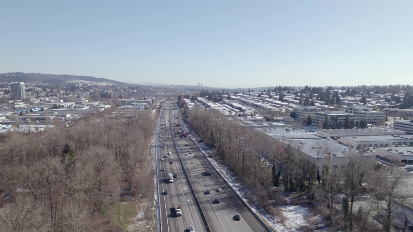 aerial view of Vancouver Canada main road highway with traffic car and truck, drone controlling traffic during rush hours in the city