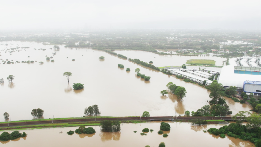 Aerial view of flooded land during the 2022 QLD Floods in Robina Gold Coast QLD Australia Royalty-Free Stock Footage #1087899793