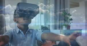 Animation of network of connections over happy african american boy wearing vr headset. family, togetherness, spending quality time concept digitally generated video.