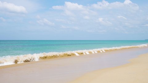 Beach space area white clouds background. Sea nature white sand with blue sky. Long beach waves gently lapping sea summer. Landscape sea water was photographed in early morning.copy space
