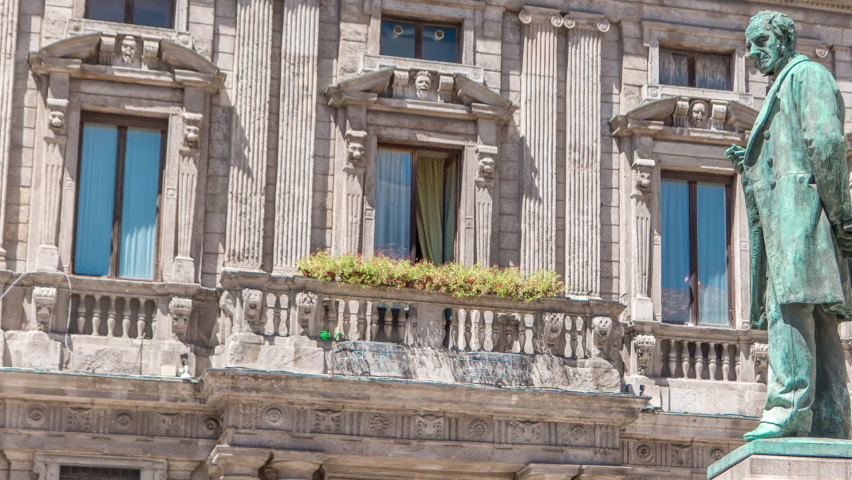Alessandro Manzoni Statue timelapse, important Italian writer and poet of the nineteenth century, Milan city center, Italy. Sunny summer day