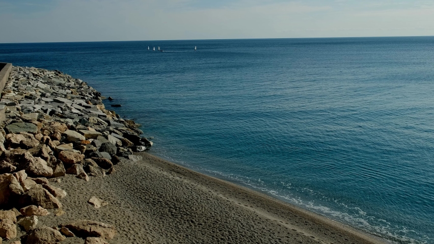 4k shot of the sea and the waves of Varigotti, in the western Ligurian Riviera, in the winter of 2022