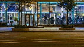 The Windows of the fitness club, facing the street with heavy traffic,time lapse - Powered by Shutterstock - Get 15% off with code: PIKWIZARD15