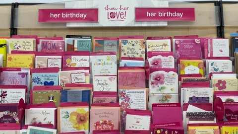 Edmonton, Canada -March 4, 2022: Birthday cards for her on display on shelves in a store