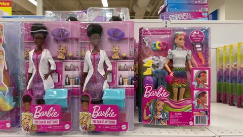 Edmonton, Canada - March 4, 2022: Packages of Mattel's Barbie Dreamtopia and You Can Be Anything dolls on display on a grocery store shelf