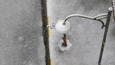 Top view of lamppost covered with snow. Winter concept.