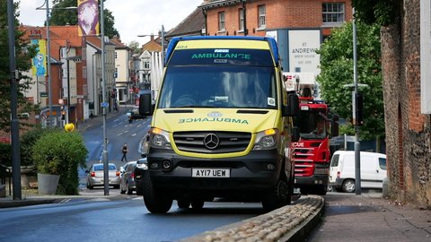Norwich, Norfolk, United Kingdom. July 28, 2020. Hazardous Area Response Team ambulances and fire appliance parked on street. 
