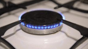 this video shows a vintage gas stove flaming.