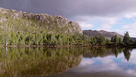 a sunset pan of the pool of siloam at walls of jerusalem national park in tasmania, australia