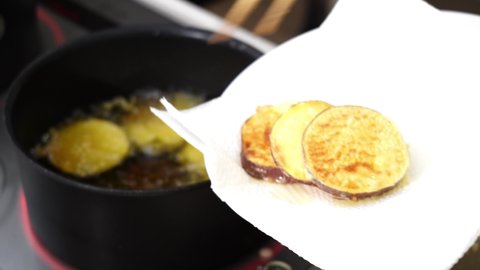Remove the sweet potato tempura from the pot