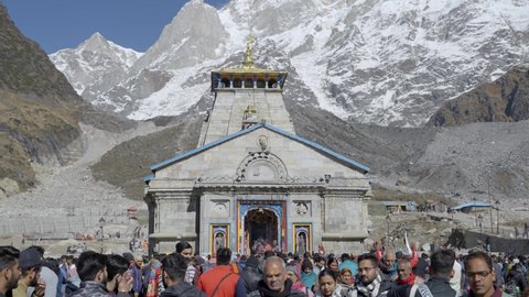 kedarnath , India - 10 29 2021: Many People Visit The Famous Kedarnath Temple With Himalayan Mountain Range In The Background