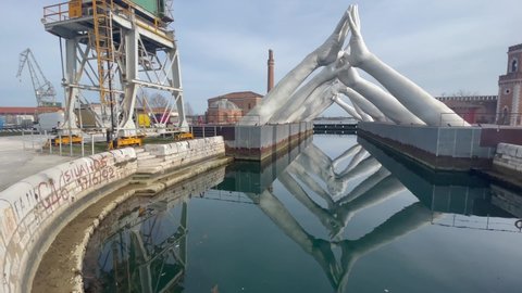 venice, italy, 24 feb 2022 installation "building bridges" in the harbour