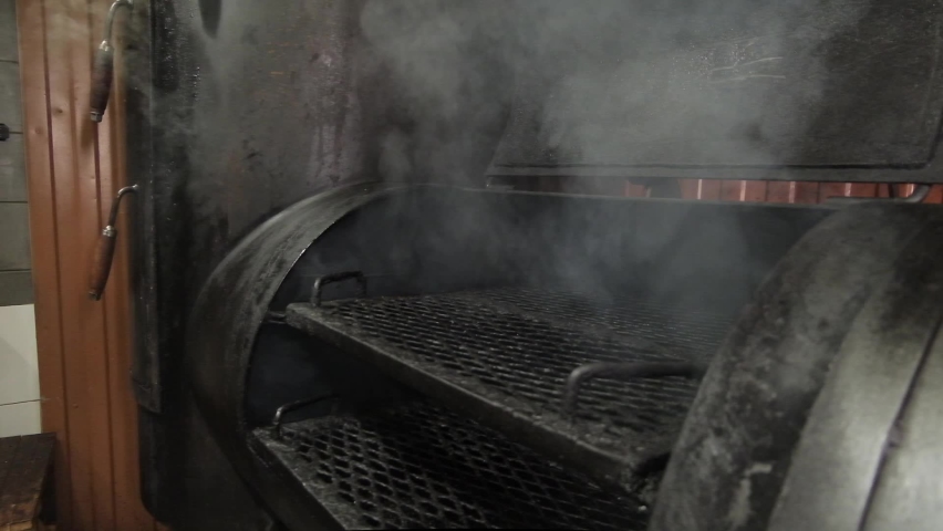Cooking Brisket in a Smoker | Shutterstock HD Video #1087931423