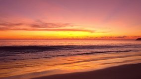 Tropical sea at sunset or sunrise over sea video 4K, The sun touches horizon, Red sky in golden hour amazing seascape,Ocean beach sunsets beautiful sky