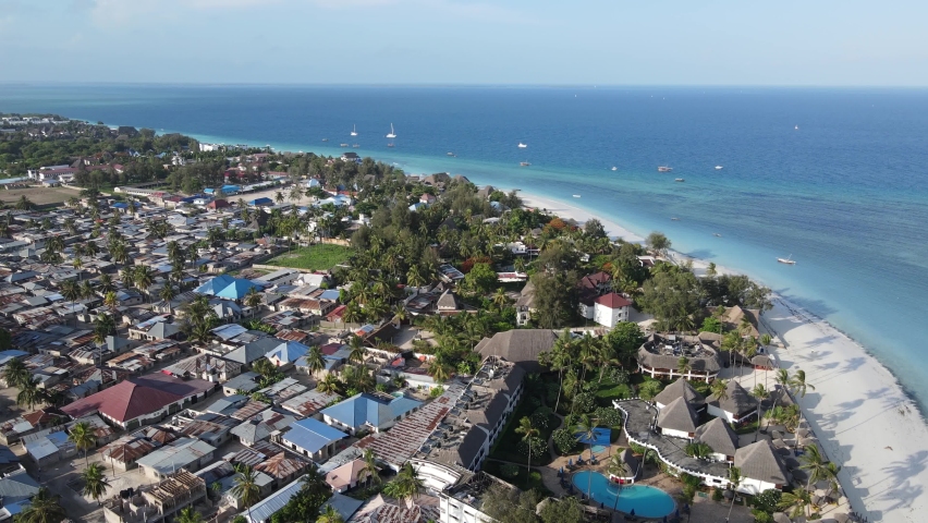 Zanzibar, Tanzania - aerial view of houses near the coast Royalty-Free Stock Footage #1087944537