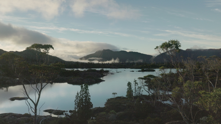 a morning wide angle view of lake elysia at the labyrinth in cradle mountain-lake st clair national park of tasmania, australia