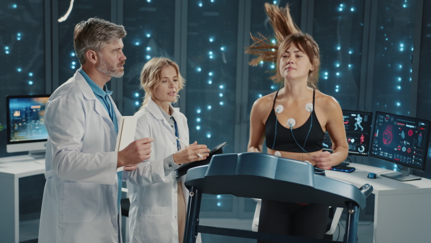 In sports laboratory young female athlete running and breaking down treadmill. Smoked office. Data center examination. Sports diagnostics. Failure. Royalty-Free Stock Footage #1087953125
