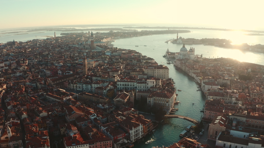 Dolly back establishing drone shot over Central Venice city at sunrise | Shutterstock HD Video #1087956861