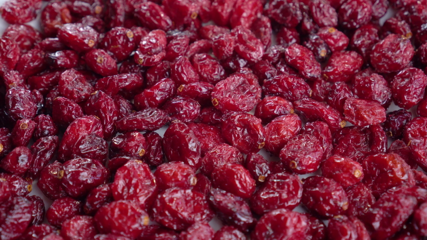 Dry cranberries. Dehydrated red sour berry. Vitamin natural food. Macro. Rotation