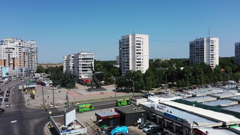 Kharkiv, Ukraine - July 17, 2021: Big Ukrainian city Kharkiv. Buildings in the city. Monument of soviet soldier. Aerial view