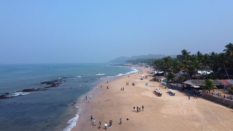 Anjuna Beach, Goa, India.Flight over the sandy beach, 2 hours before the sunset. Arabic see and it's warm and calm waves!