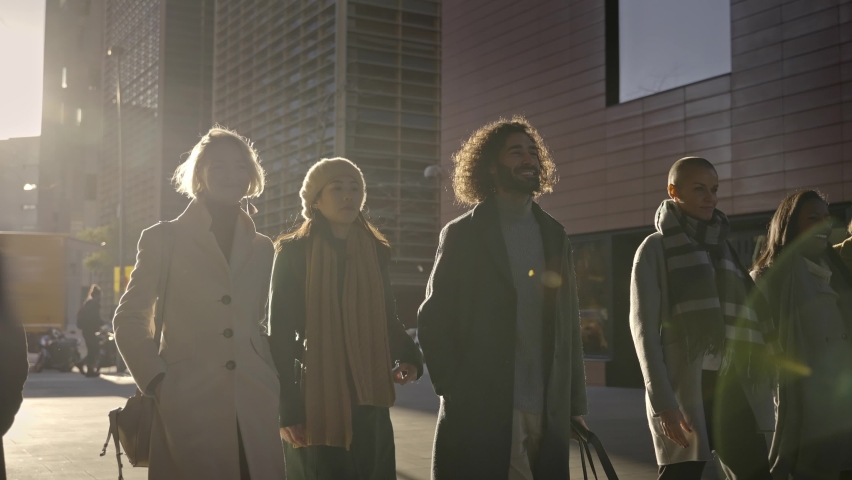 Group of successful business professionals in the city - Team walking together with confidence and determination 