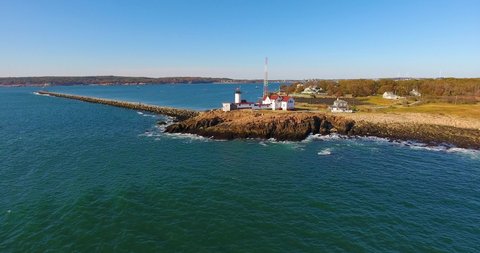 Aerial view of Eastern Point Lighthouse and Gloucester Harbor, Cape Ann, northeastern Massachusetts MA, USA. This historic lighthouse was built in 1832 on the Gloucester Harbor entrance.