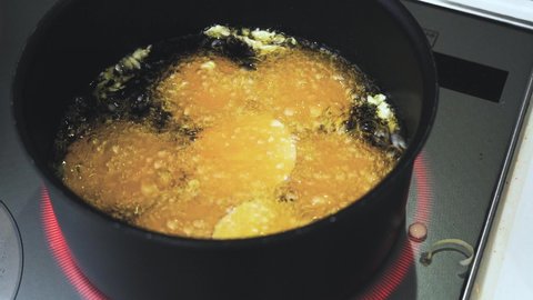 Frying sweet potato tempura at IH