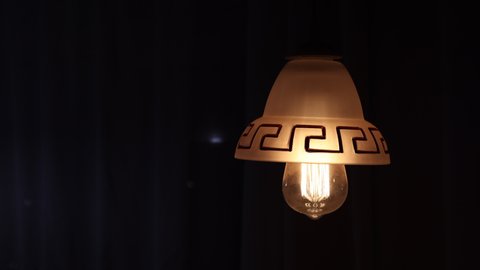 Edison Vintage Retro Lamp Bulbs Lighting Is Glowing Decoration In Loft Style. Electric Bulb Light In The Dark. Slider Shot.