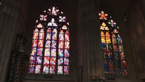 Interior and stained glass windows in St. Vitus Cathedral in Prague. March 2022, Prague, Czech Republic
