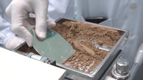 Apothecary or 
pharmacist contain dried herbal powder to capsule filling machine with herbal medicine in manufacturing pharmaceutical laboratory.  - Powered by Shutterstock - Get 15% off with code: PIKWIZARD15