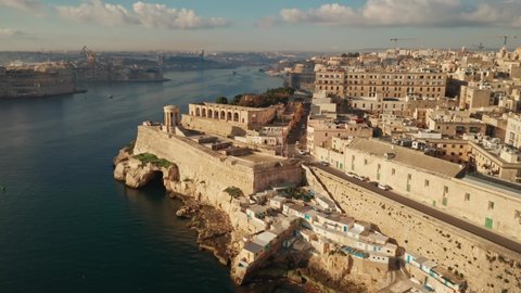 Aerial view of Valletta city - capital of Malta. Siege Bell War Memorial, Morning, Lower Barrakka Gardens