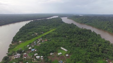 Aerial drone shot of remote village situated along the river in South America between Suriname and French Guyana.
