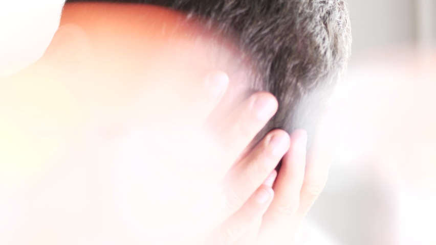 unrecognizable, man rubbing his head in despair