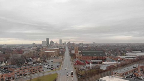 Cars Driving In The Street With Skyline Of Downtown Rochester During Early Spring In Rochester, New York. - aerial