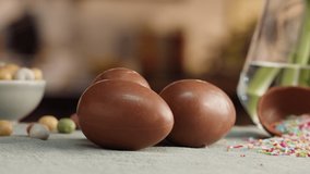 Happy Easter holiday. Chocolate eggs close-up. Preparing for Easter, painting and decorating eggs. Christian celebration, family traditions. - Powered by Shutterstock - Get 15% off with code: PIKWIZARD15
