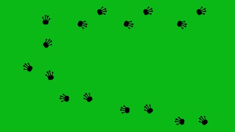 Loop animation of the black silhouette of the legs of a frog, toad or reptile. On a green chroma key background
