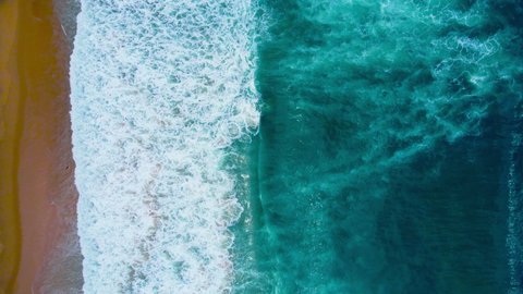Nature video 4K Aerial view of drone. Scene of top view beach and seawater on sandy beach in summer. Nature and travel concept.