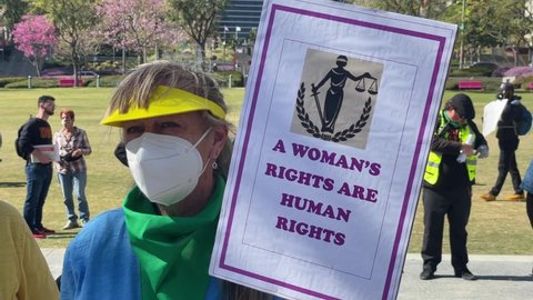 Demonstrator march during a rally to oppose the growing assault on abortion rights to mark International Women's Day, in Los Angeles, on March 8, 2022.