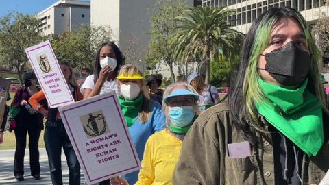Demonstrator march during a rally to oppose the growing assault on abortion rights to mark International Women's Day, in Los Angeles, on March 8, 2022.