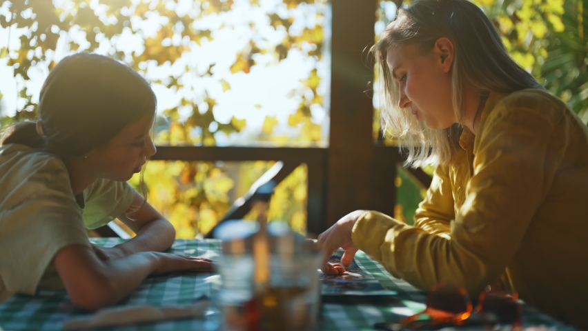 Family is is choosing food from menu in restaurant.