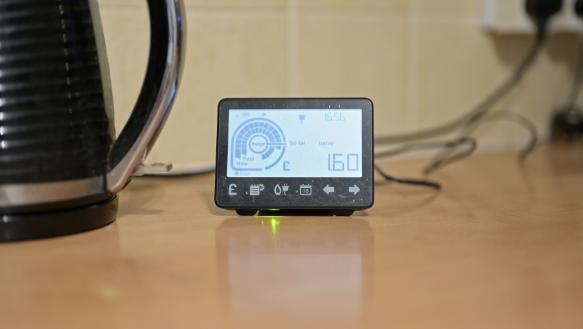 Slow rotation around a Smart Meter as a kettle is turned on Royalty-Free Stock Footage #1088047413